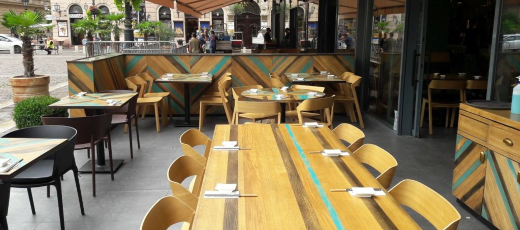 Outdoor terrace of Japanika Basilica restaurant in Budapest.