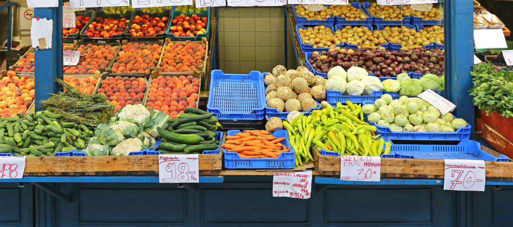 Colorful fresh produce stall at a Budapest market.