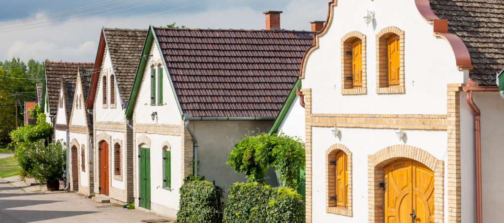 Traditional wine cellars in Hajós, Hungary, lined up in a picturesque street.