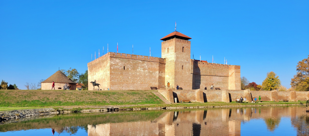 Brick-built Gyula Castle surrounded by parkland and the famous thermal lake, one of Hungary’s best-preserved fortresses.