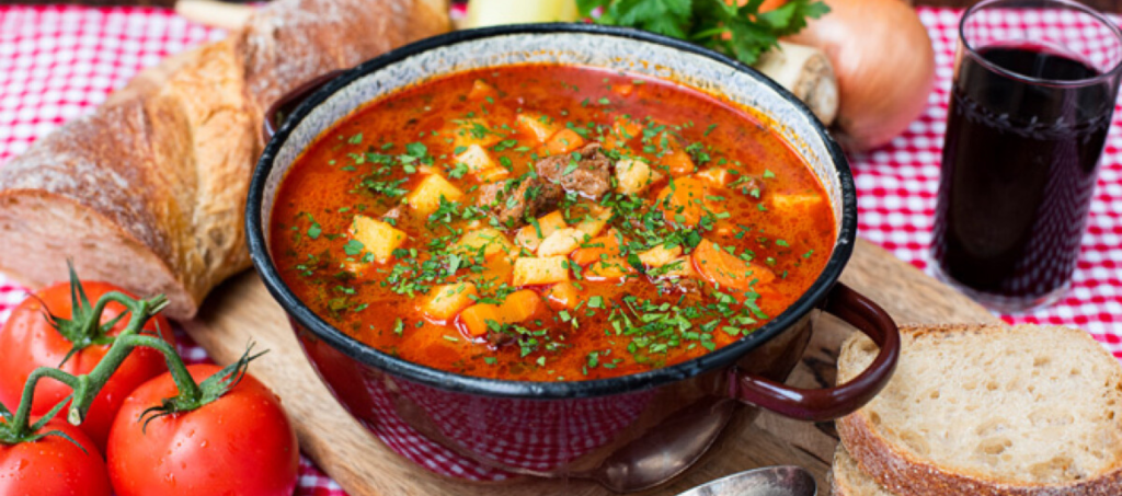 Traditional Hungarian goulash soup served with tender beef, potatoes, and paprika.